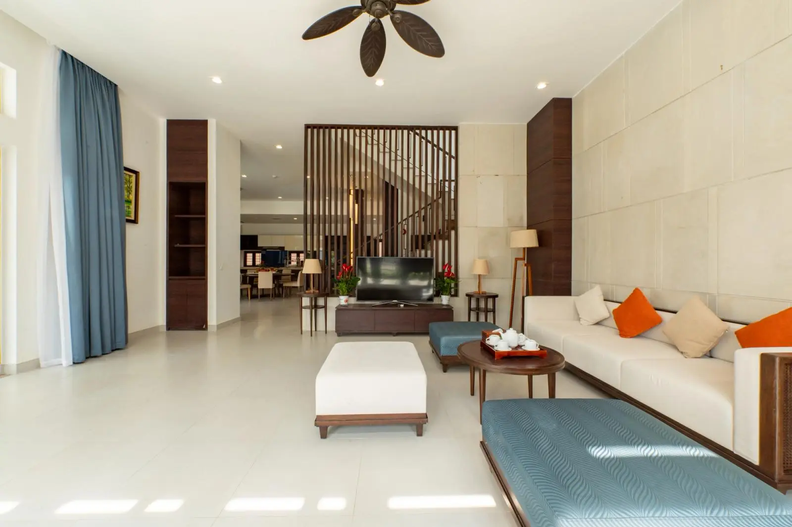 A bright modern living room with sofas
