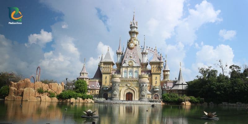 Fairytale-style castle at VinWonders Phu Quoc overlooking a lake with colorful architecture