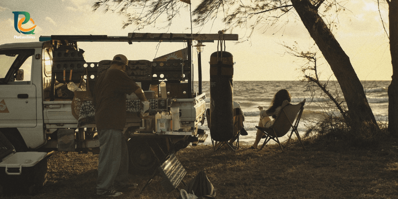Traveler enjoying drinks from a mobile beach bar at Truong Beach Phu Quoc by the sea